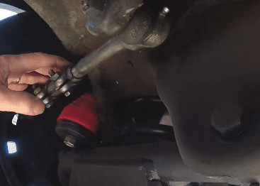 Tie rod sleeve orientation with bolt heads away from bump stops