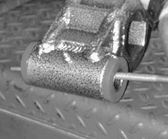 Filing burr from inside of twin tube sleeve