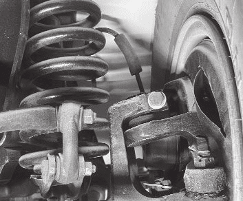 Typical sway bar installation with DJM Dream Beams showing coil spring and bracket