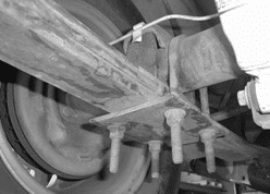 Spring plate and U-bolts installed during Ford Ranger axle flip