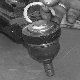 New lower control arm installed on vehicle (Fig #13)