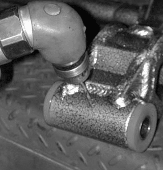 Deburring pivot sleeve with a rat tail file (Fig #8)