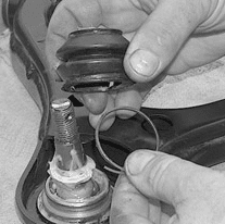 Removing the clip holding the ball joint boot (Fig #1)