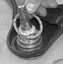 Removing C-clip and pressing out ball joint on upper arm (Fig #2)
