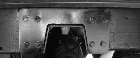 Frame support notched and bolted to frame