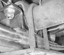 Upper axle plate installed with pin down on top of axle