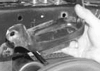 Removing factory bump stop bracket for frame notch clearance (Fig #3)