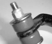 Correctly tightened sway bar end link with 2 to 3 threads past the nylock nut