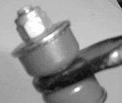 Over-tightened sway bar end link with too many threads past the nut