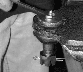 Installing the grease fitting on the lower ball joint