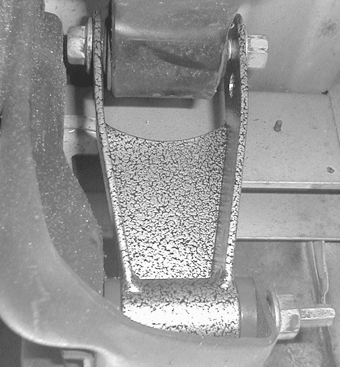 DJM rear shackle installed with bushings down and open side forward