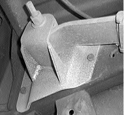 DJM rear spring hanger bolted to the frame in the original mounting holes