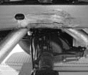 Factory bump stop bracket welded under the frame rail